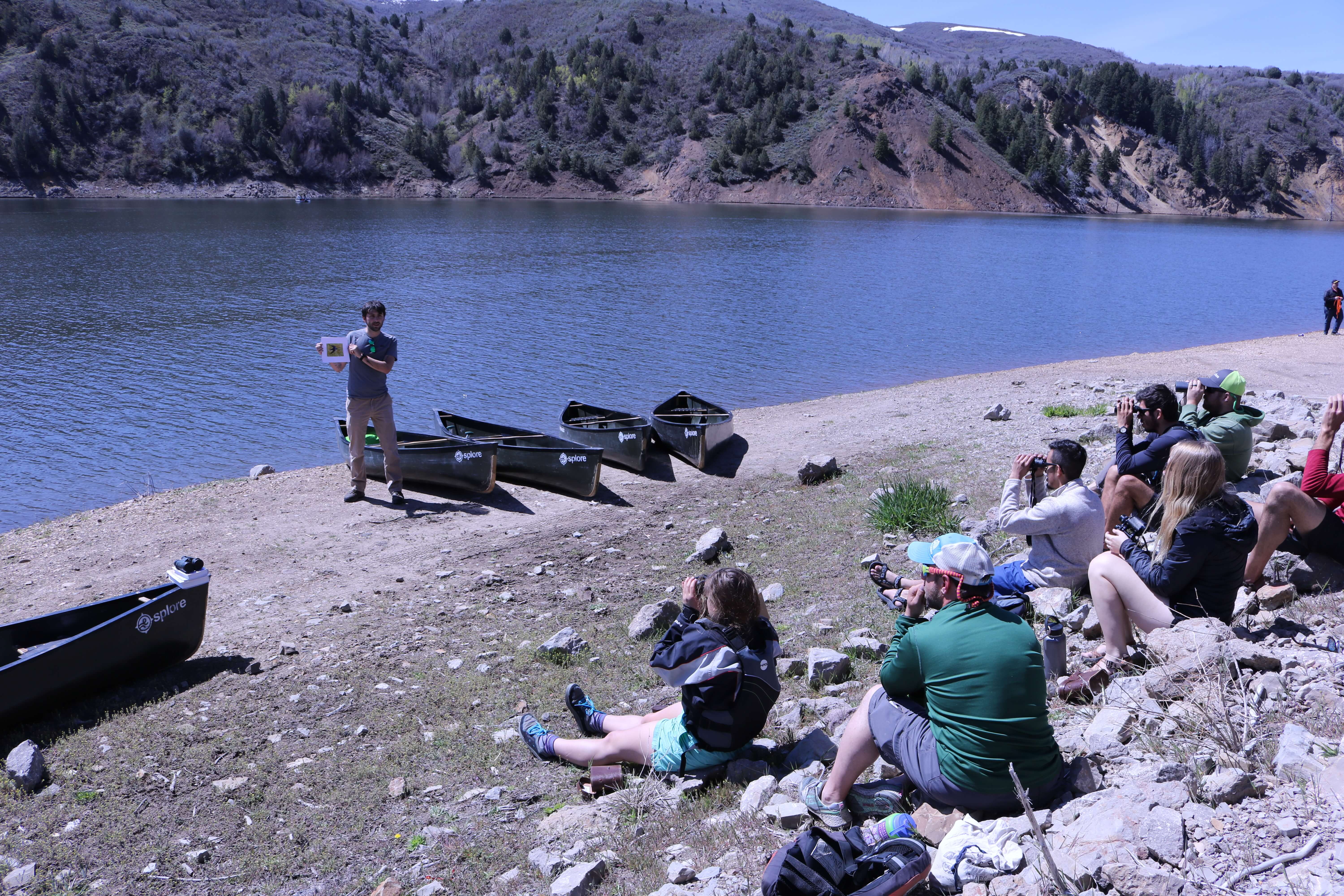 Ambassador JJ Horns demonstrates birding techniques in the field.