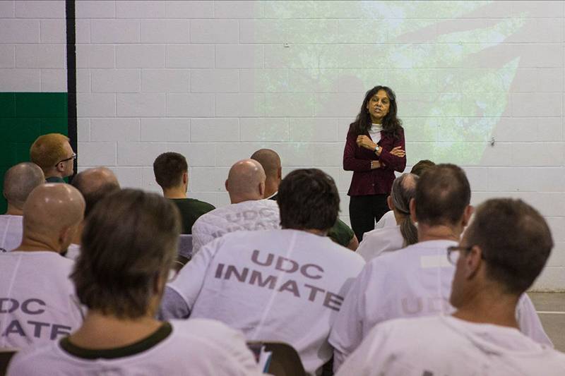 STEMAP Program Director Nalini Nadkarni talks about trees at the Utah State Prison.