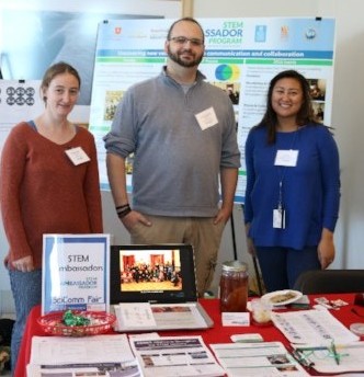 Ambassadors Julia McGonicle, Kevin Davenport, and Judy Ou at the STEMAP table.