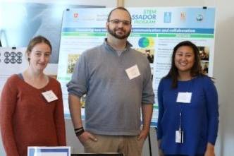 Ambassadors Julia McGonicle, Kevin Davenport, and Judy Ou at the STEMAP table.