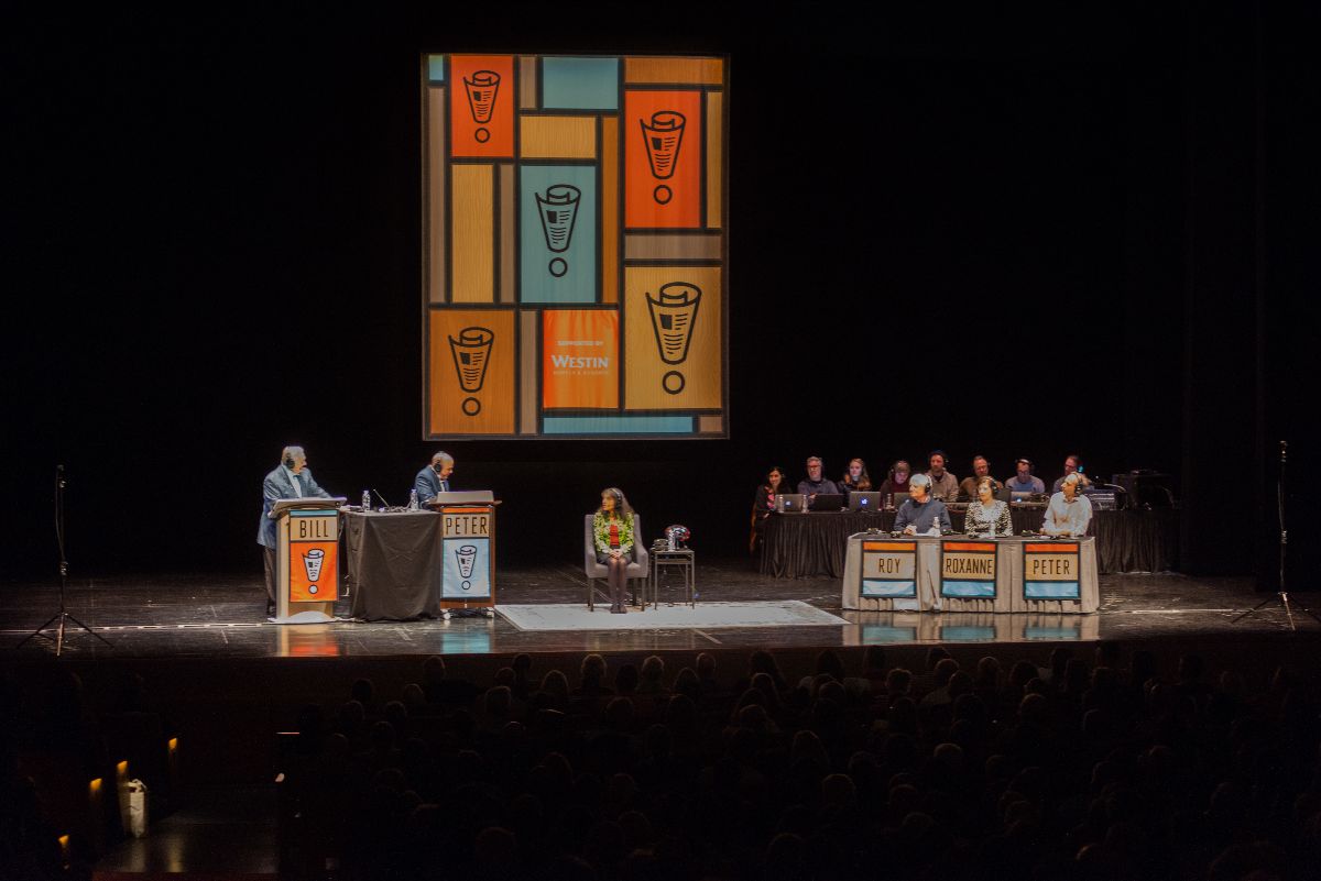 Nalini answers questions onstage during taping of Wait Wait Don’t Tell Me.